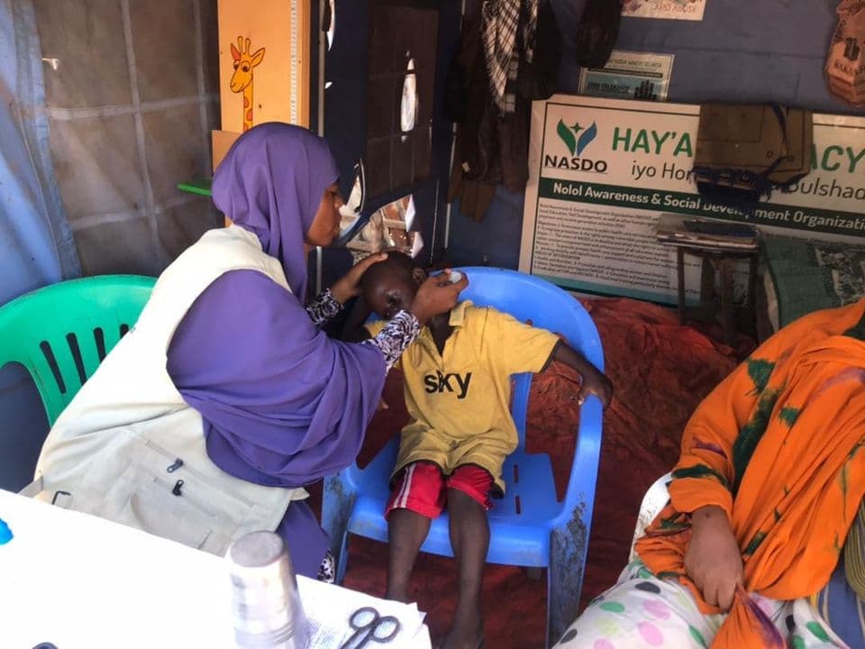 Healthcare outreach with essential medicines in Baarey Village